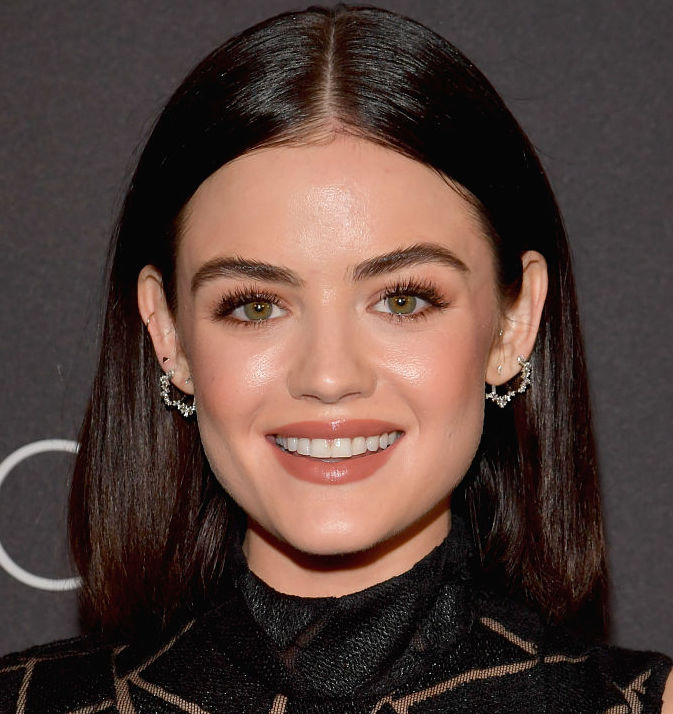 Lucy Hale got to hang out with a baby bear, and we could not be more ...