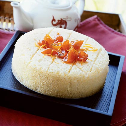 Premium Photo | Close up of delicious fresh chinese steamed sponge cake  named fa gao for lunar new year festival traditional food over red table  background.
