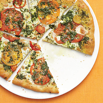 https://static.onecms.io/wp-content/uploads/sites/19/2013/06/26/mozzarella-heirloom-tomato-basil-pizza-ck-x.jpg