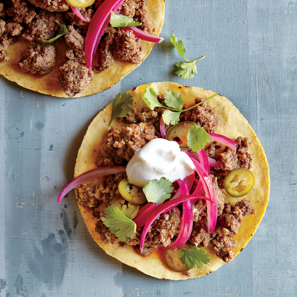 https://static.onecms.io/wp-content/uploads/sites/19/2015/05/20/beef-tostadas-quick-pickled-onions-ck.jpg
