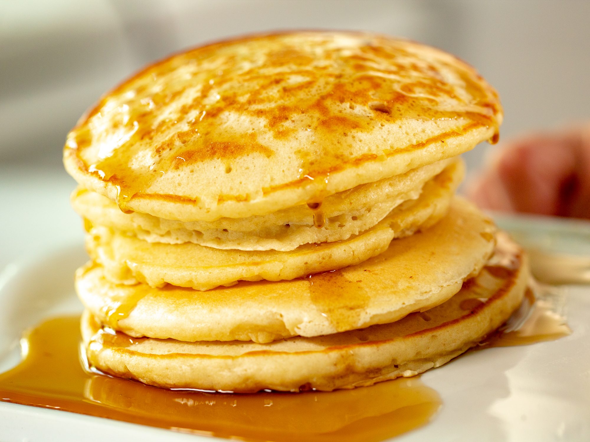 https://static.onecms.io/wp-content/uploads/sites/19/2019/10/08/fluffy-pancakes-dcms-large-2000.jpg
