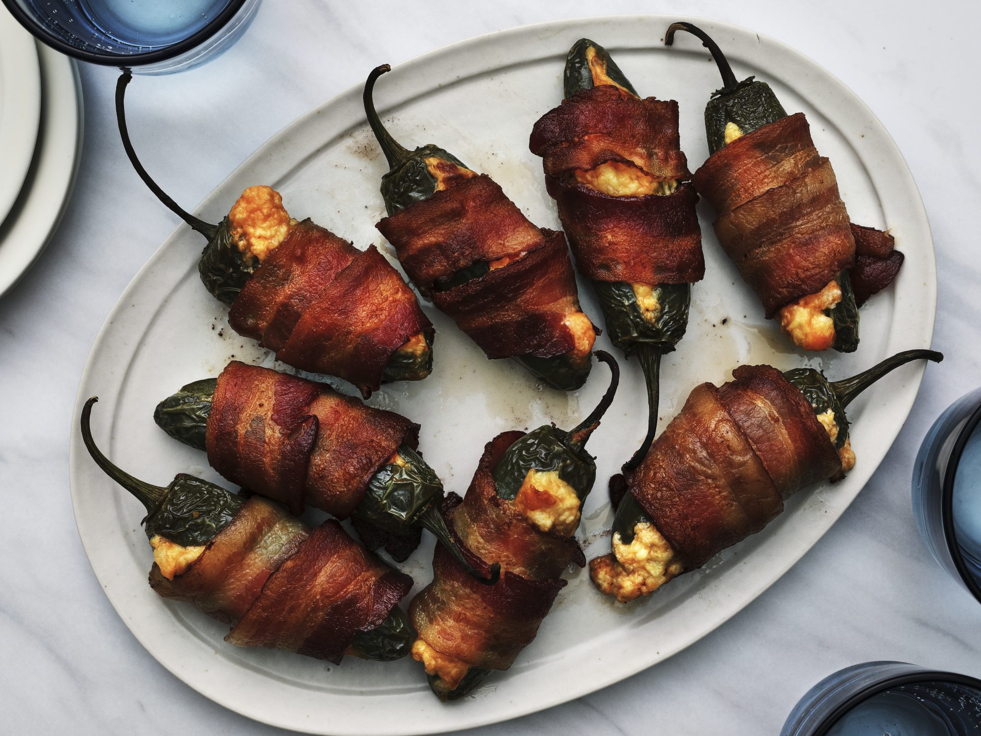 https://static.onecms.io/wp-content/uploads/sites/19/2020/02/28/bacon_wrapped_jalapeno_poppers_0011-2000.jpg