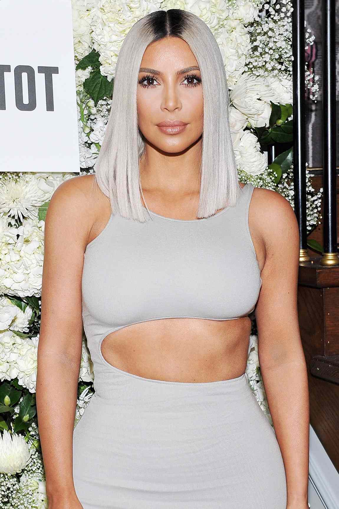 Kim Kardashian Changing Hairstyle Shows Off Blonde Extensions People Com