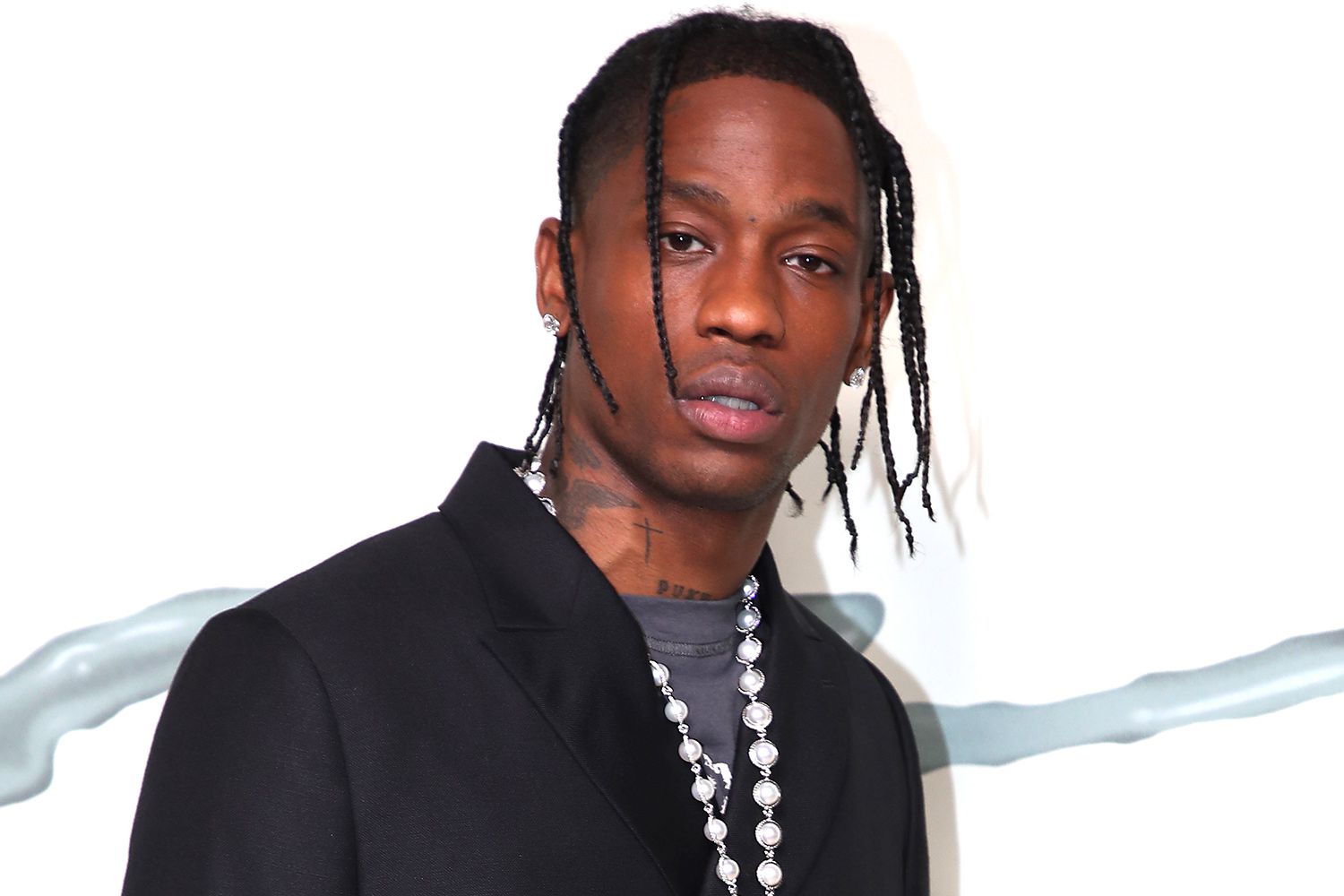 Why does travis scott never look at the camera?