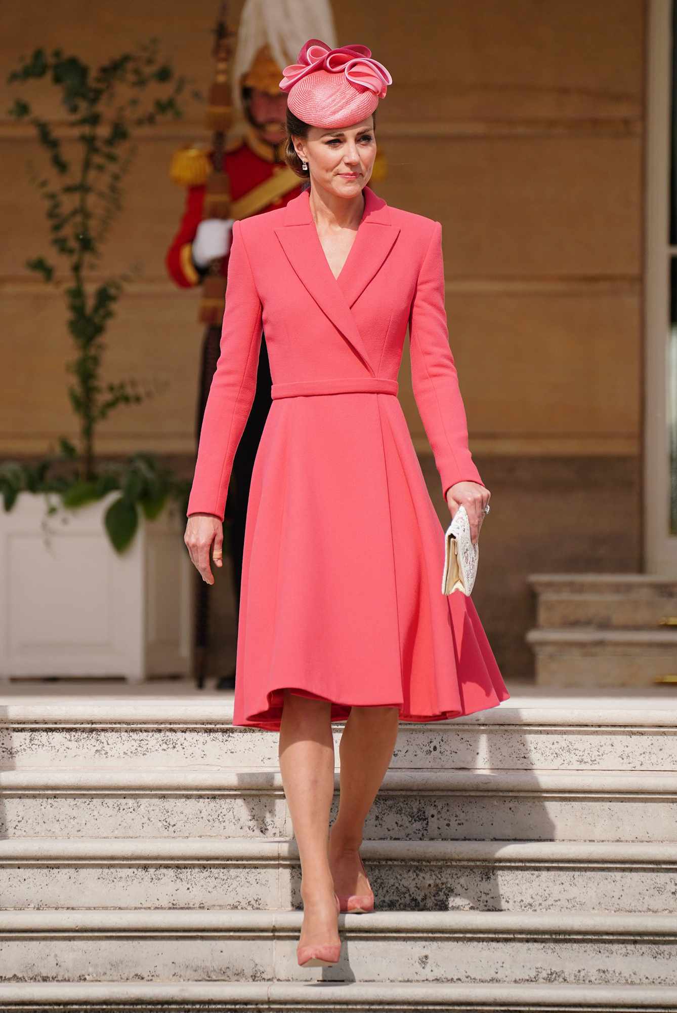 Kate Middleton Steps Out in Coral at Buckingham Palace Garden Party |  PEOPLE.com