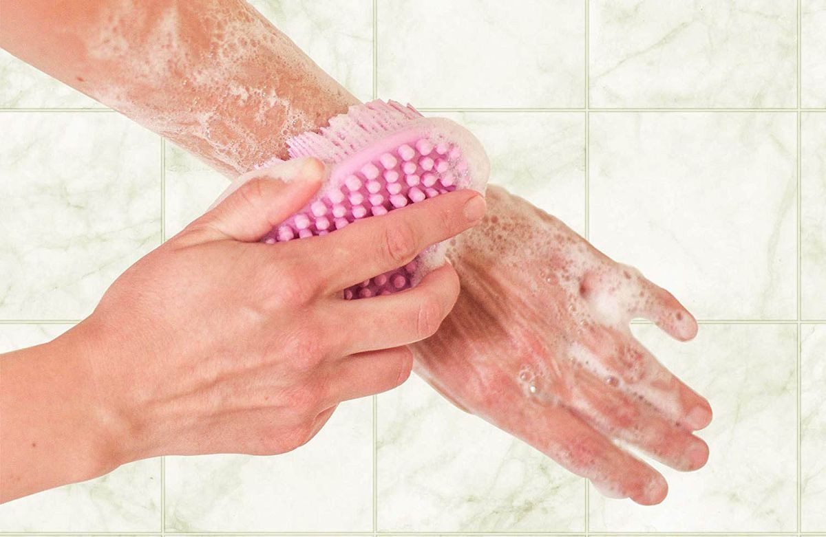 This $10 Silicone Body Scrubber Doesn&#39;t Get Riddled with Bacteria Like Your  Classic Fluffy Loofah | Southern Living
