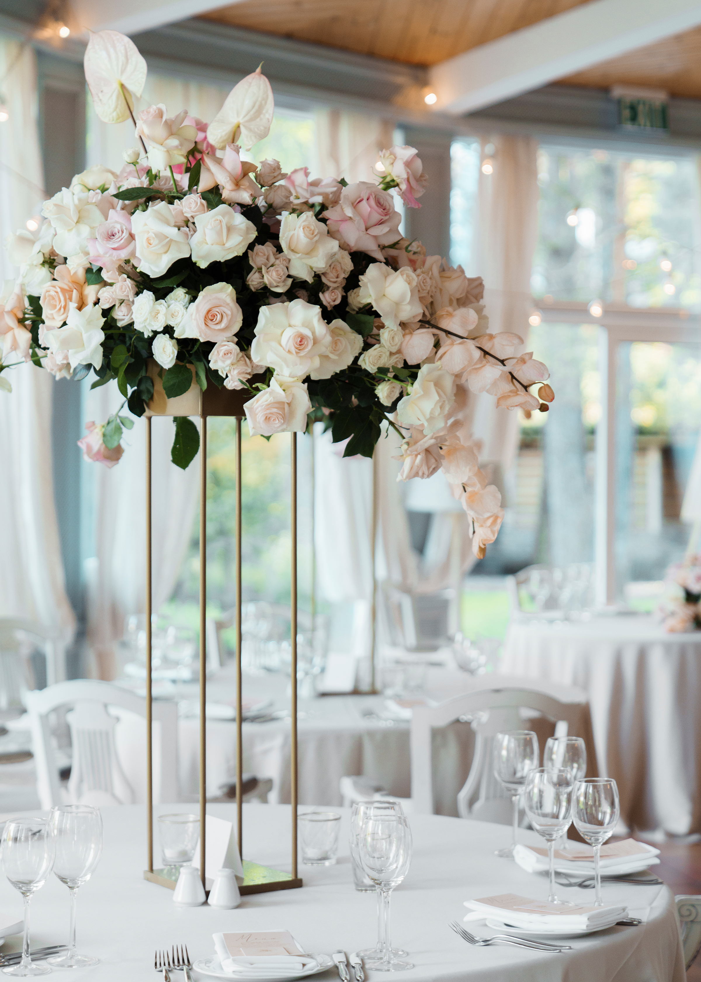 29 Tall Centerpieces That Will Take Your Reception Tables to New