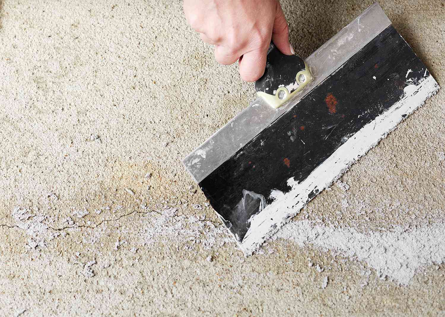 how to patch cracks in concrete floor before painting