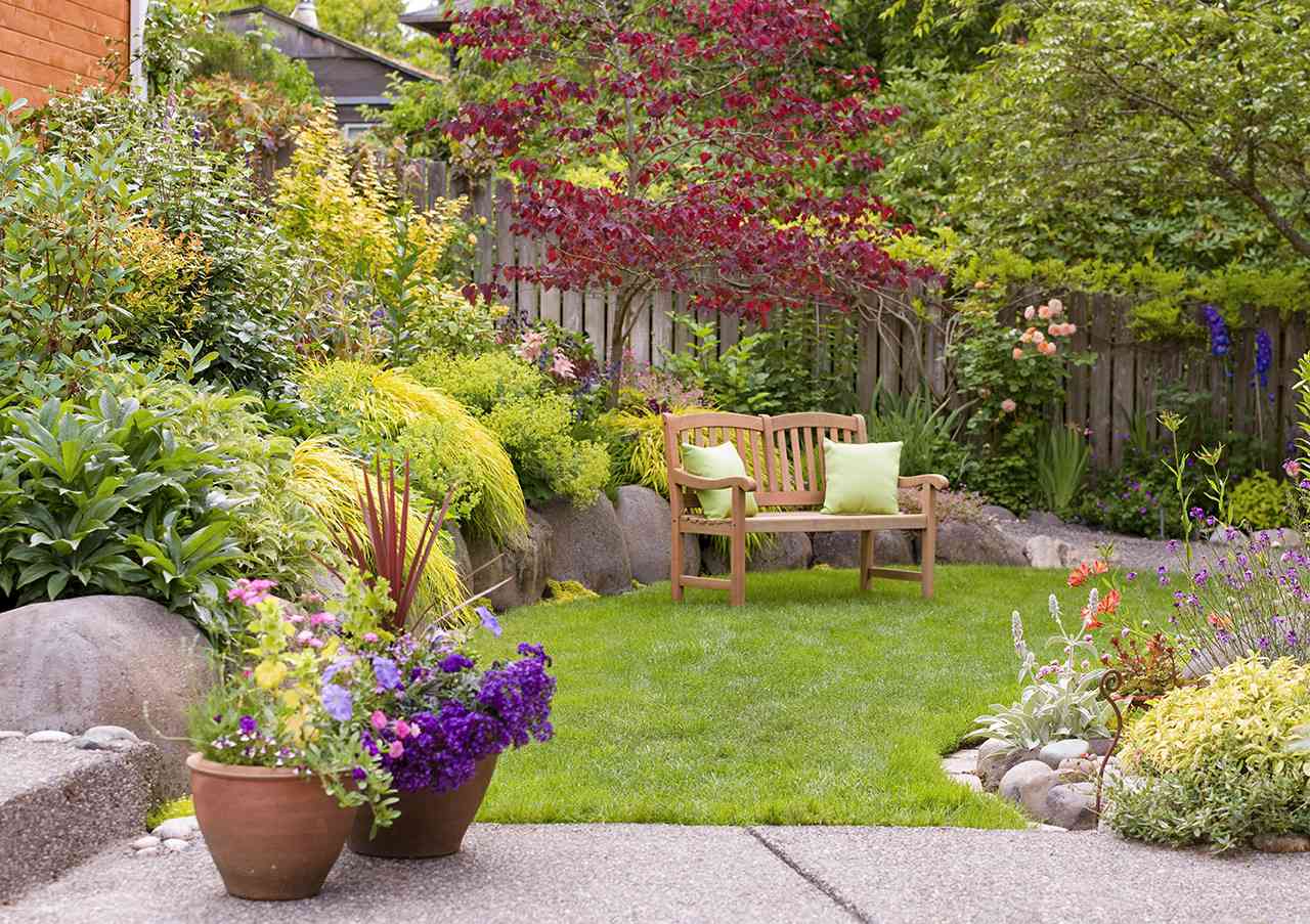 Planting On A Slope Better Homes, Small Sloping Backyard Landscaping Ideas