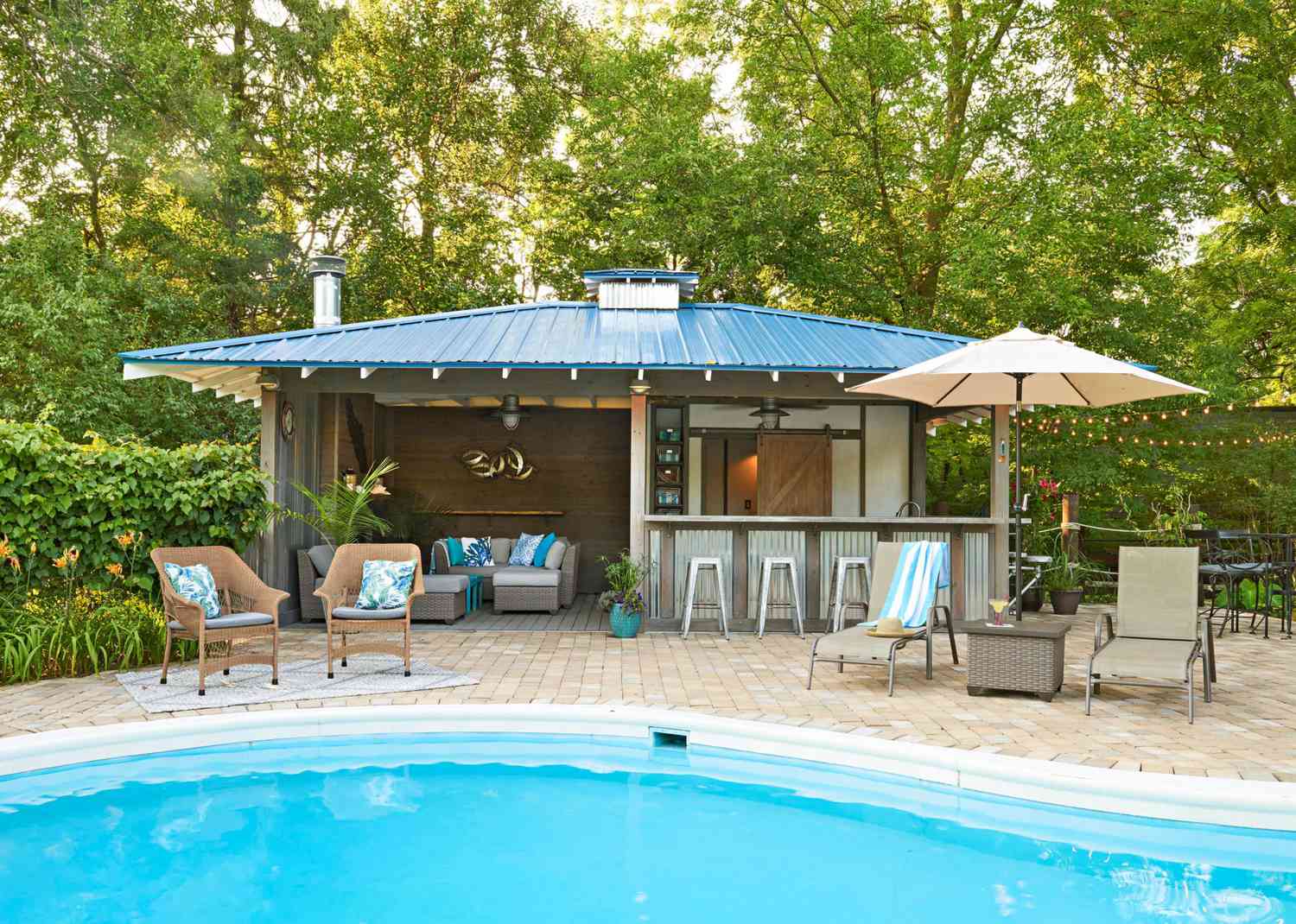 A Backyard Pool House With Fun Island Vibes Midwest Living
