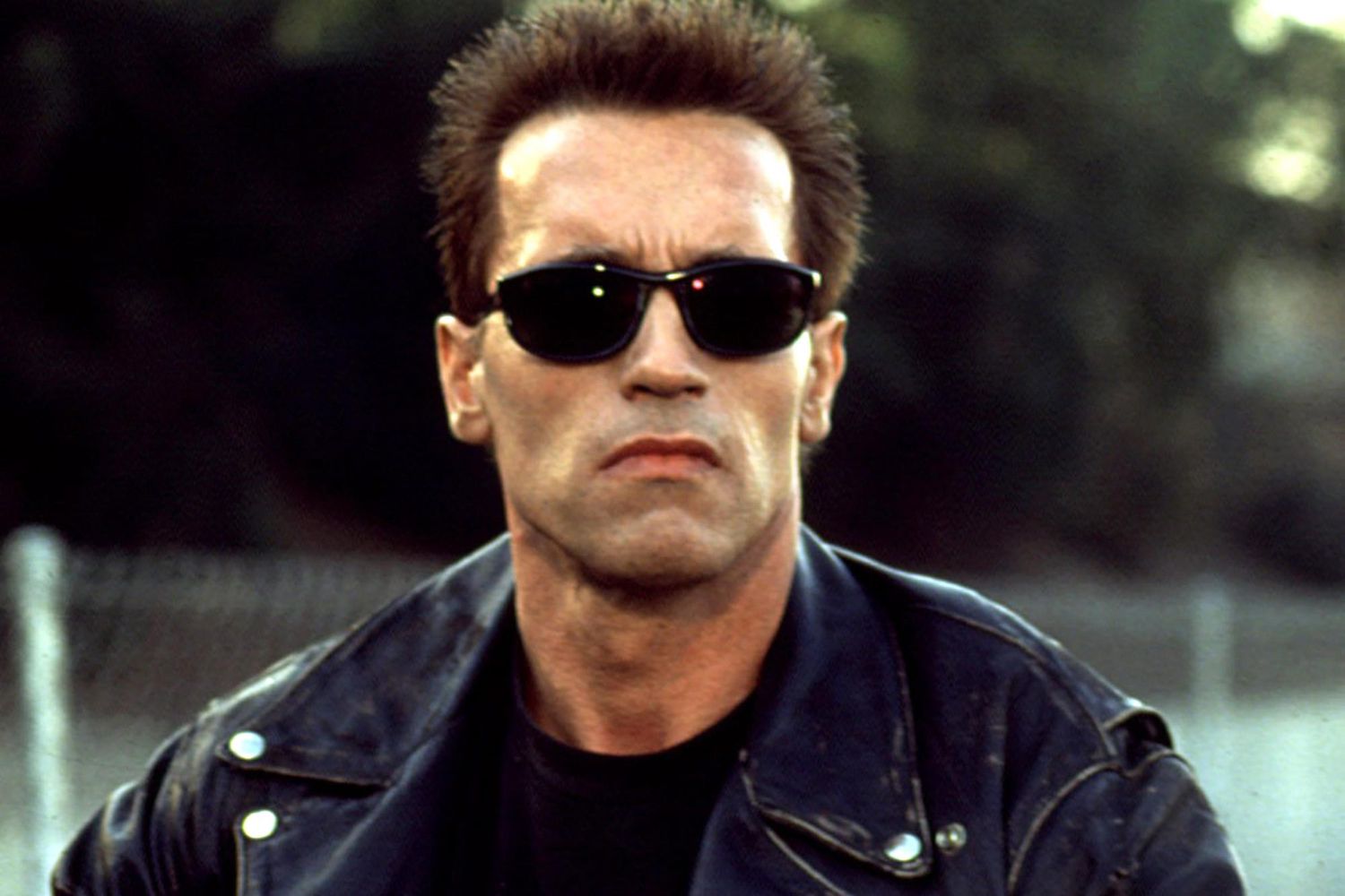 Arnold Schwarzenegger dons 'we'll be back' mask while biking | EW.com